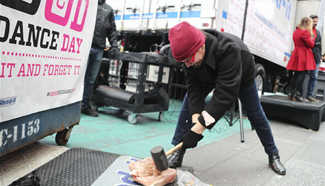 Good Riddance Day event held at Times Square in New York